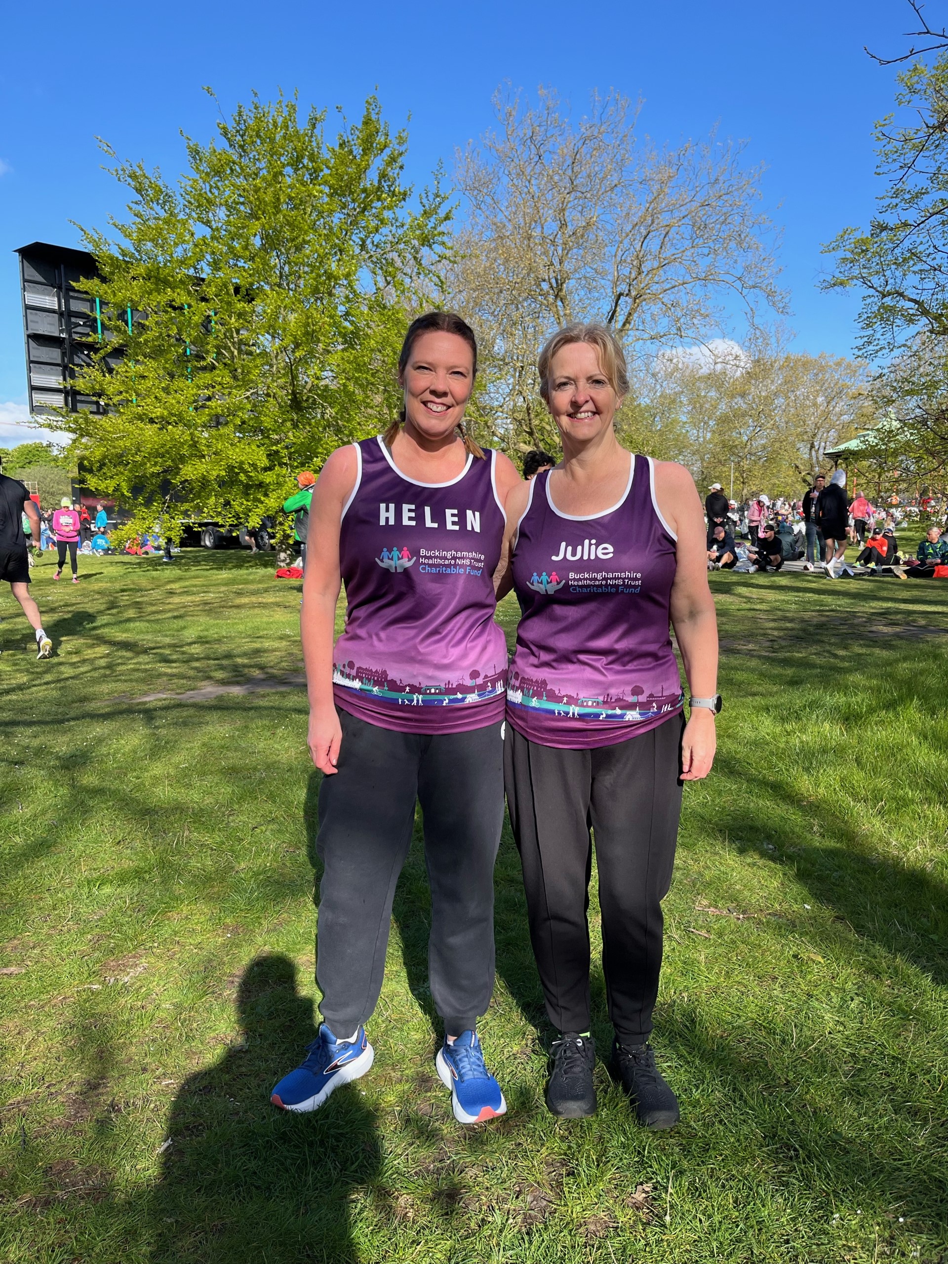 Helen and Julie wearing their purple Buckinghamshire Healthcare NHS Trust Charitable Fund running vest